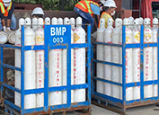 Cylinders of oxygen are delivered to a hospital near company operations in Papua.