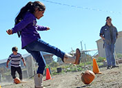 An elementary student puts her best foot forward at the pumpkin patch event at the University of Arizona Cooperative Extension in Duncan during the recently held Biodiversity Week