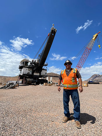 Roy Vidales, Senior Supervisor Shovel/Drill Maintenance-Safford Operations, shows one of Safford’s new shovels during its assembly.