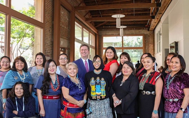 Graduates of Project DreamCatcher pose with U. S. Representative Greg Stanton. DreamCatcher is a partnership between the Freeport-McMoRan Foundation and the Thunderbird School of Global Management. (Photo by Kalle Benallie/Cronkite News)